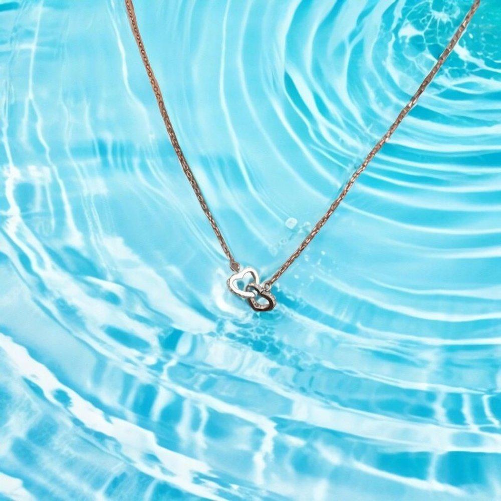 Women s Silver 925 Cubic Twisted Double Heart Necklace
Women s Silver 925 Cubic Twisted Double Heart Necklace