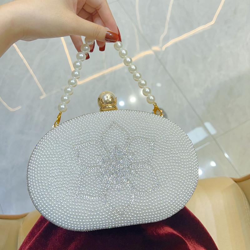 2025 Luxury High-end Handmade Pearl Diamonds Flower Evening Clutch Bag Fashion Rhinestone Wedding Banquet Handbags Shoulder Bag
2025 Luxury High-end Handmade Pearl Diamonds Flower Evening Clutch Bag Fashion Rhinestone Wedding Banquet Handbags Shoulder Bag