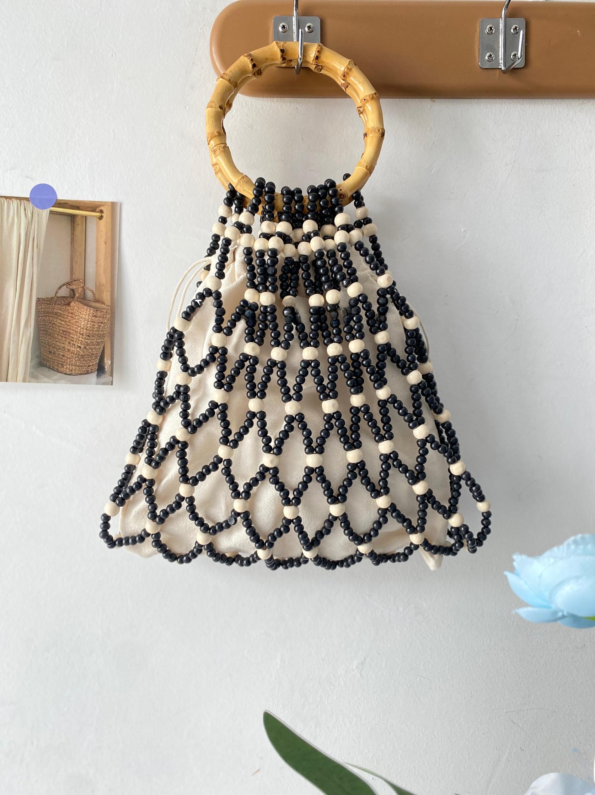 Hanrted Beaded Wooden Handle Beach Bag Trendy Small Batch Handbag Korean Sle Casual Op Bag Pure Color Spring Season чёрный
Hanrted Beaded Wooden Handle Beach Bag Trendy Small Batch Handbag Korean Sle Casual Op Bag Pure Color Spring Season чёрный