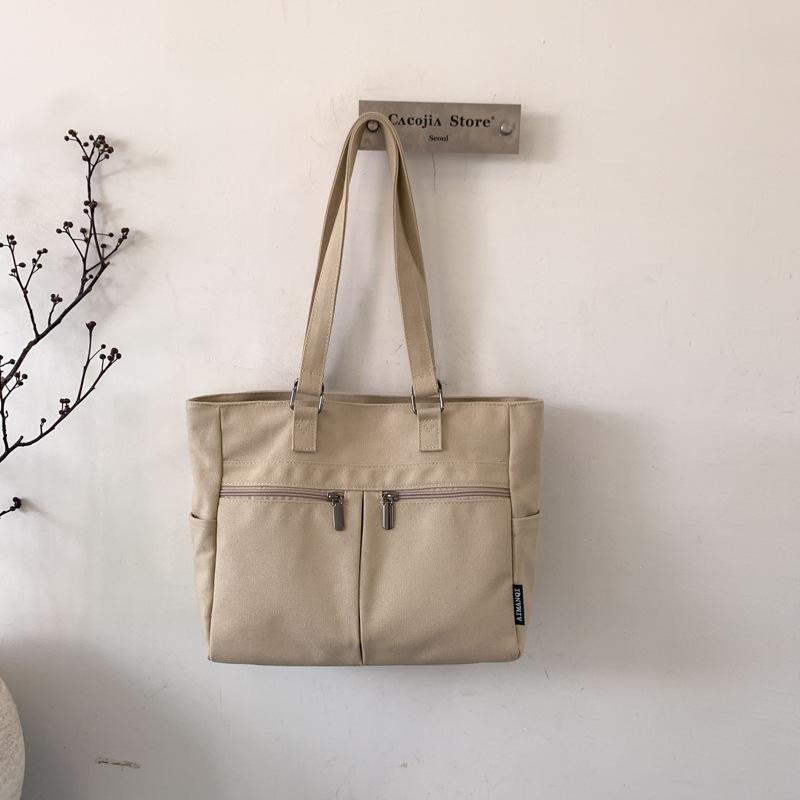 New Spring Women Shoulder Bag Fashi Multi Pocket Commuter Canvas Tote Handle Bag Comfortable and Versatile Texture Storage Bag хакі
New Spring Women Shoulder Bag Fashi Multi Pocket Commuter Canvas Tote Handle Bag Comfortable and Versatile Texture Storage Bag хакі
