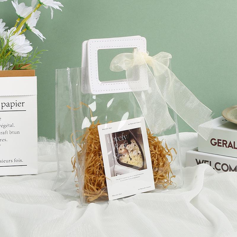 Transparent PVC Tote Bag for Weddings and Bridesmaid Gifts - Candy Gift Bag with Plastic Packaging
Transparent PVC Tote Bag for Weddings and Bridesmaid Gifts - Candy Gift Bag with Plastic Packaging