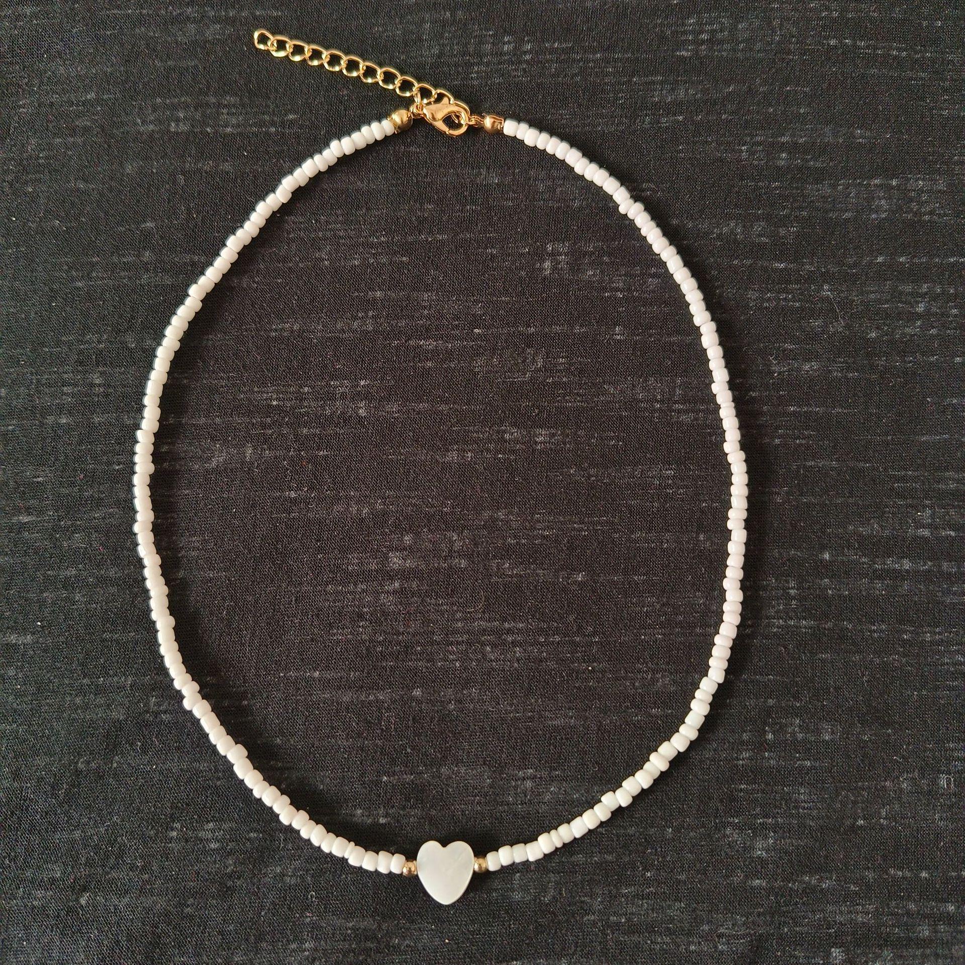 Multicolored Love Heart Mother-of-Pearl Pendant Seed Bead Choker Necklace for Women & Girls
Multicolored Love Heart Mother-of-Pearl Pendant Seed Bead Choker Necklace for Women & Girls