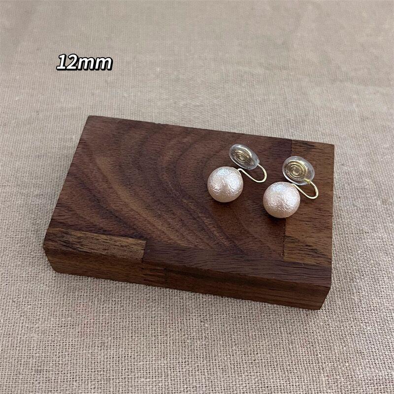 Mona earrings cotton big pearl retro temperament stud earrings light luxury high sense French earrings show face little girl
Mona earrings cotton big pearl retro temperament stud earrings light luxury high sense French earrings show face little girl