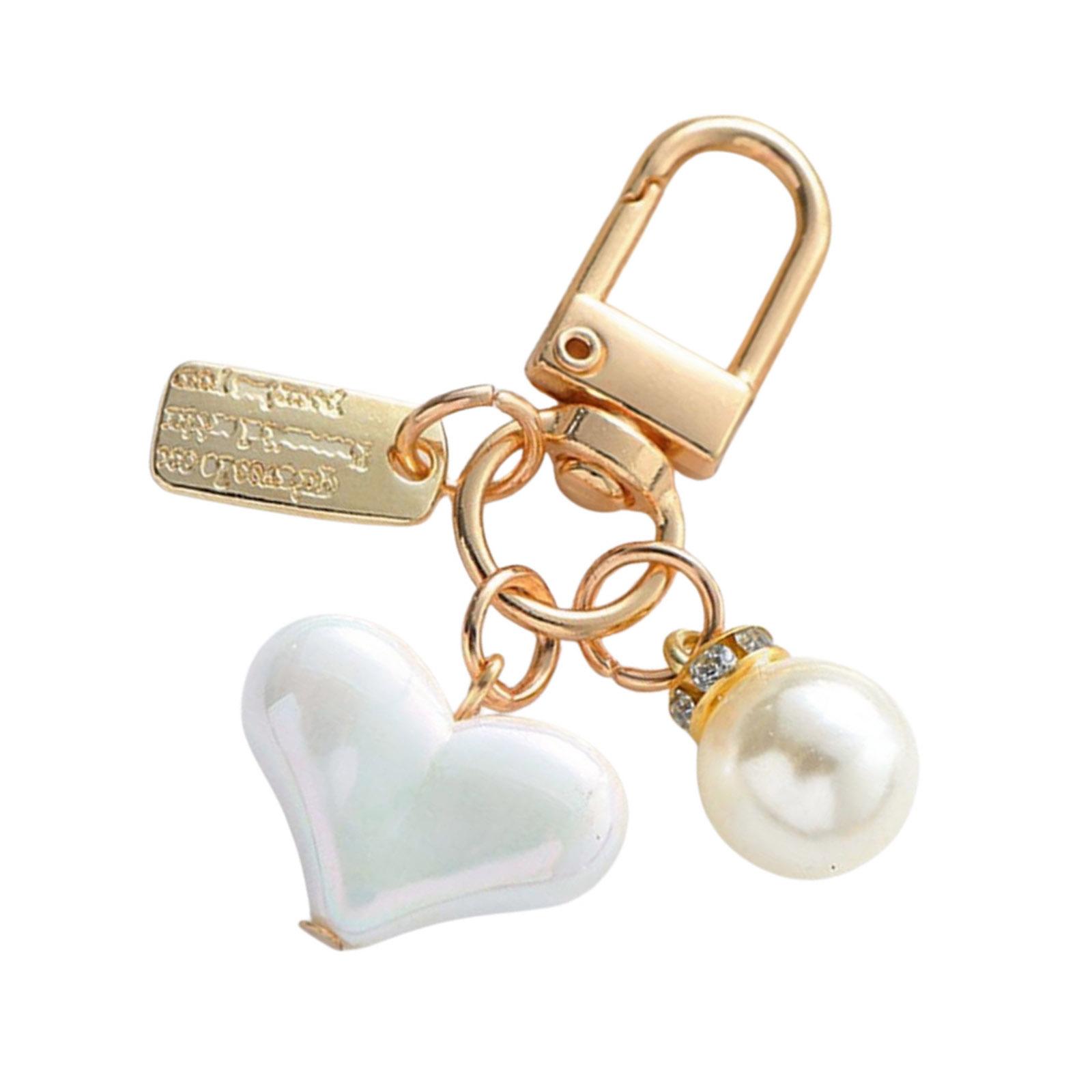 Модний брелок зі сплаву та перлів, універсальна прикраса-брелок у формі серця з рожевих перлів, підходить для різних аксесуарів 6
Модний брелок зі сплаву та перлів, універсальна прикраса-брелок у формі серця з рожевих перлів, підходить для різних аксесуарів 6