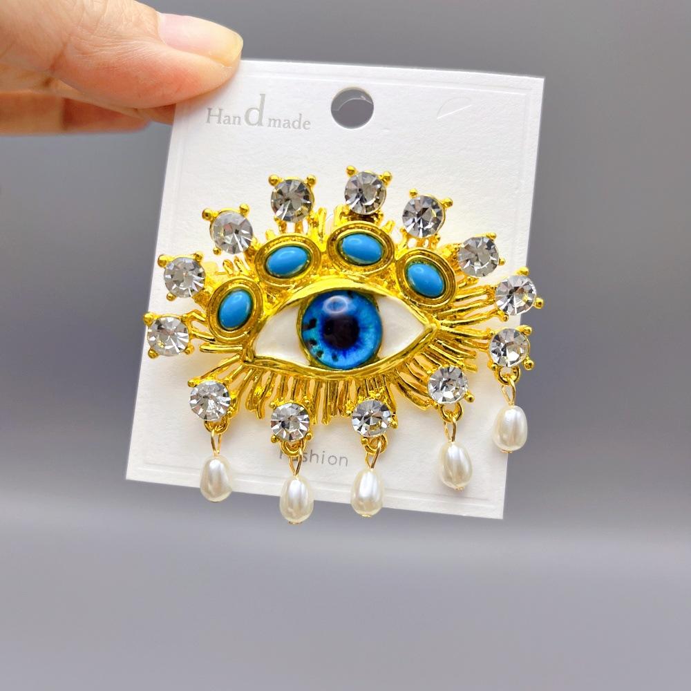 Vintage Eye-Shaped Tassel Brooch Rhinestones & Pearl Lapel Pins for Women and Men Elegant Badge Fashion Jewelry Accessory синий
Vintage Eye-Shaped Tassel Brooch Rhinestones & Pearl Lapel Pins for Women and Men Elegant Badge Fashion Jewelry Accessory синий