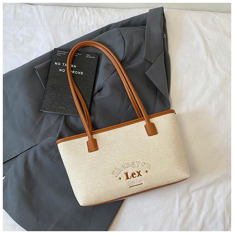 Contrasting colors 2025 spring new bags women s fashion versatile high-quality texture commuting to work casual simple shoulder bag
Contrasting colors 2025 spring new bags women s fashion versatile high-quality texture commuting to work casual simple shoulder bag