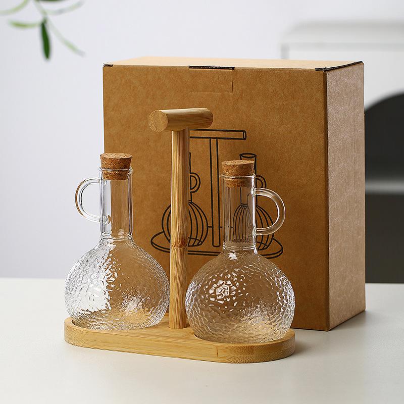 300ml Glass Oil Cruet with Wooden Stand, Heat Resistant Sauce & Vinegar Bottle, Kitchen Condiment Dispenser with Spout
300ml Glass Oil Cruet with Wooden Stand, Heat Resistant Sauce & Vinegar Bottle, Kitchen Condiment Dispenser with Spout