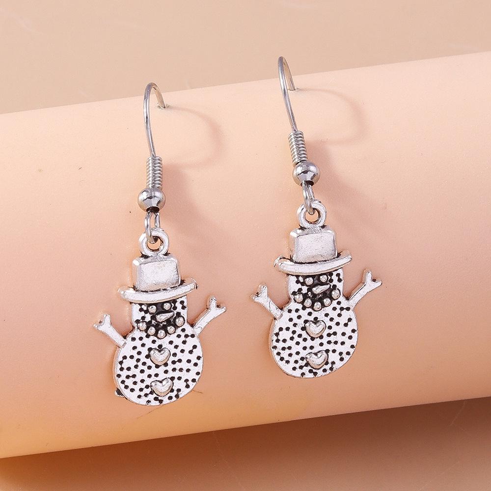 Vintage Santa Reindeer & Snowflake Christmas Earrings
Vintage Santa Reindeer & Snowflake Christmas Earrings