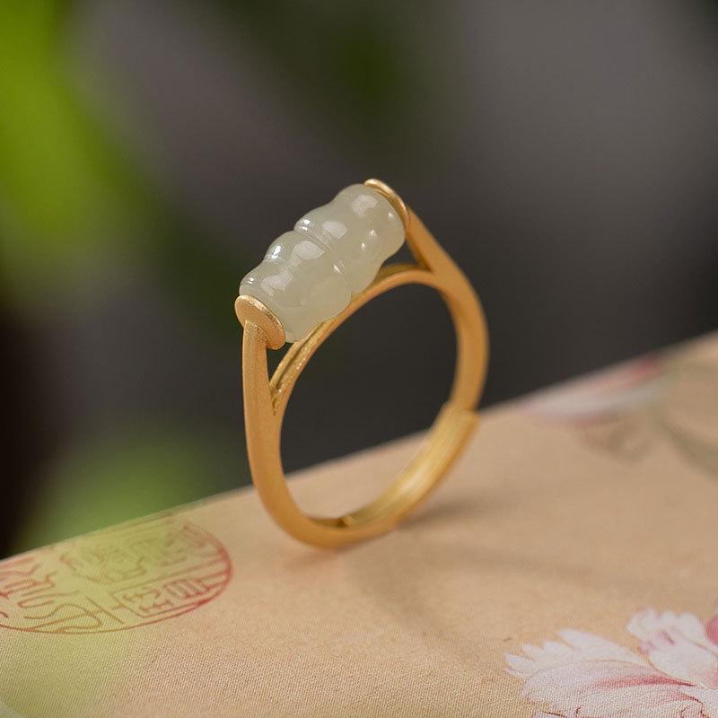 Natural Imitation Hetian Jade Bamboo Ring: Retro-Style Lucky Bead Gilt Jewelry for Women Adjustable
Natural Imitation Hetian Jade Bamboo Ring: Retro-Style Lucky Bead Gilt Jewelry for Women Adjustable