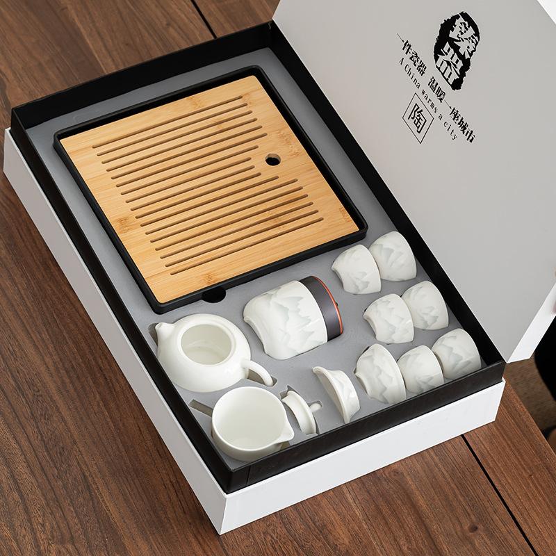 Ink and wash Jiangshan suet jade white porcelain Kung Fu tea set, teapot tea can light luxury small set, company business gift
Ink and wash Jiangshan suet jade white porcelain Kung Fu tea set, teapot tea can light luxury small set, company business gift