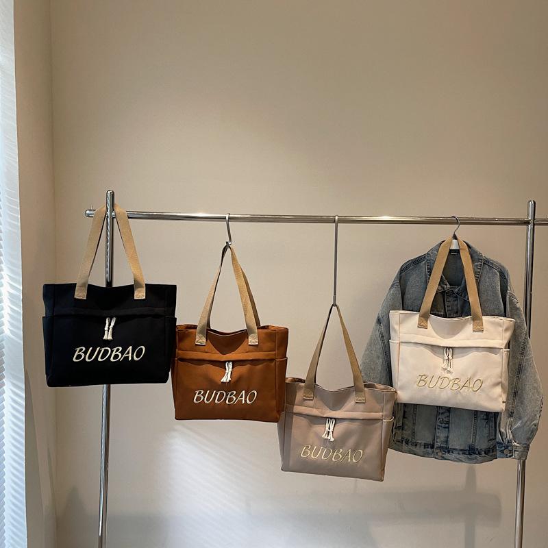 Simple and stylish letter tote cloth bag large-capacity casual commuter shoulder bag new student versatile portable women s bag one size fits all чёрный
Simple and stylish letter tote cloth bag large-capacity casual commuter shoulder bag new student versatile portable women s bag one size fits all чёрный