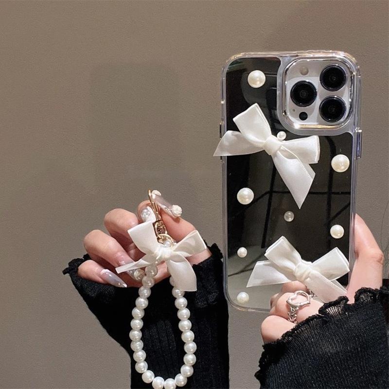 Applicable To Iphone16Pro Mobile Phone Case, Apple 17Pro Mirror High-End Sense 15, Pearl Bow 15 Handling iPhone 7/8/SE 2020
Applicable To Iphone16Pro Mobile Phone Case, Apple 17Pro Mirror High-End Sense 15, Pearl Bow 15 Handling iPhone 7/8/SE 2020