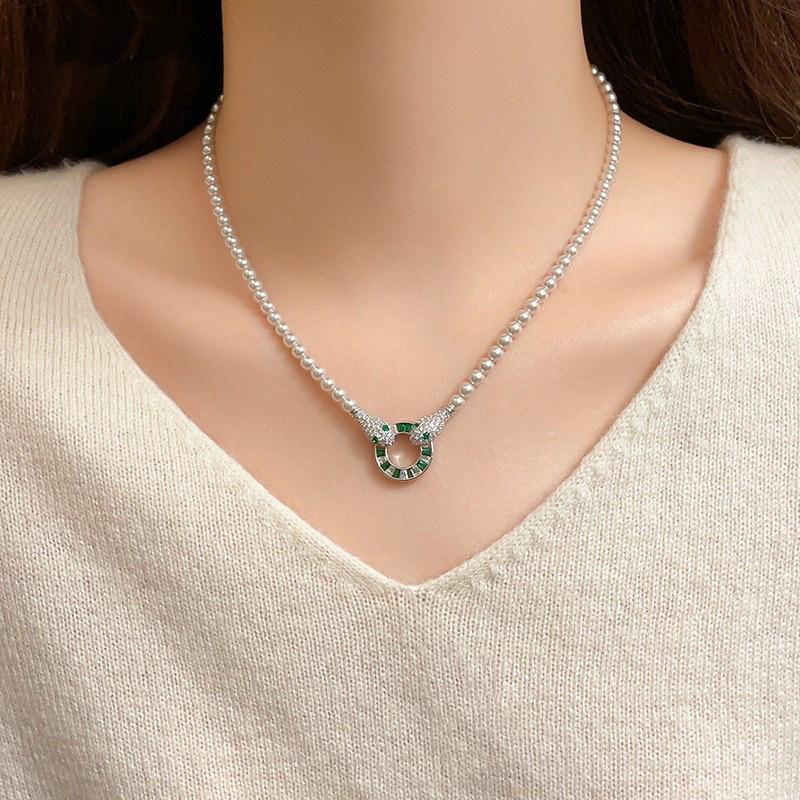 Zircon pearl serpentine round necklace niche design sense collarbone chain fashion cold style necklace
Zircon pearl serpentine round necklace niche design sense collarbone chain fashion cold style necklace