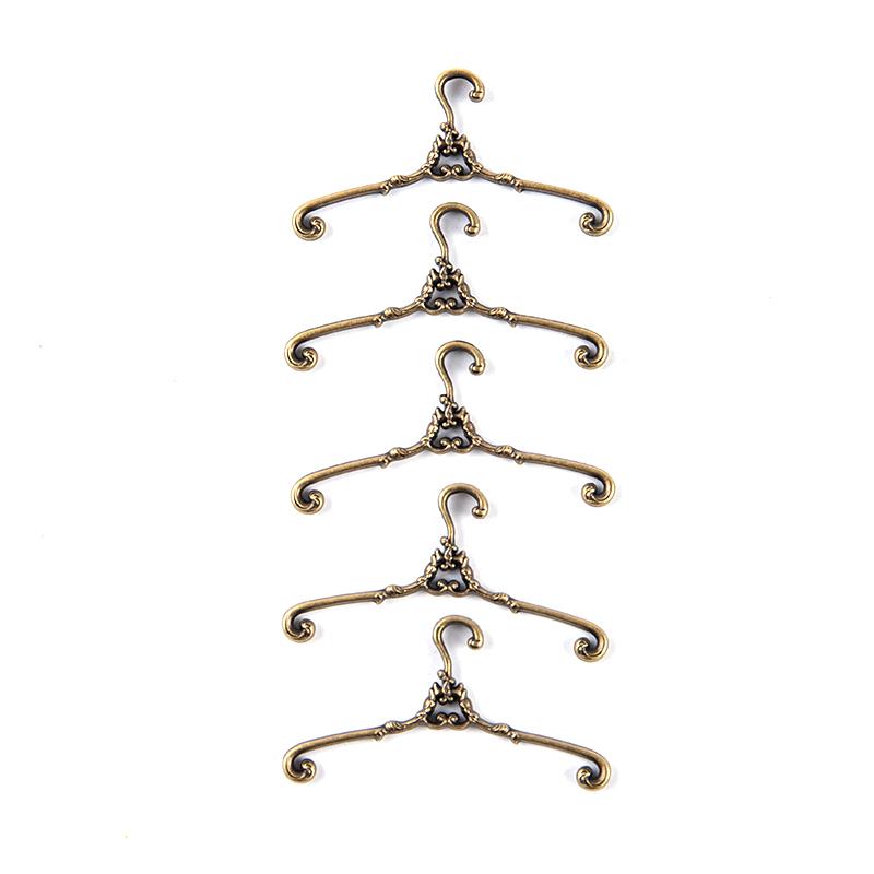 Ретро металлическая мини-вешалка для сушки детской одежды из сплава 4cm бронзовый
Ретро металлическая мини-вешалка для сушки детской одежды из сплава 4cm бронзовый