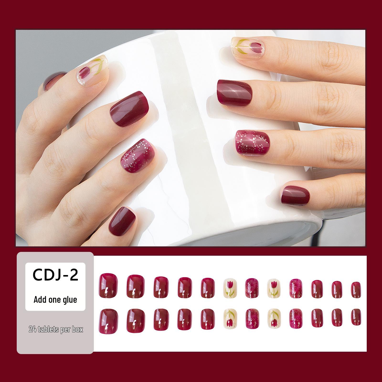 Набор из 24 накладных ногтей винно-красного цвета с цветами тюльпанов и блестящими акцентами
Набор из 24 накладных ногтей винно-красного цвета с цветами тюльпанов и блестящими акцентами