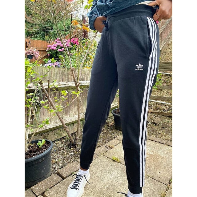 Черные узкие брюки с тремя полосками adidas Originals adicolor
Черные узкие брюки с тремя полосками adidas Originals adicolor