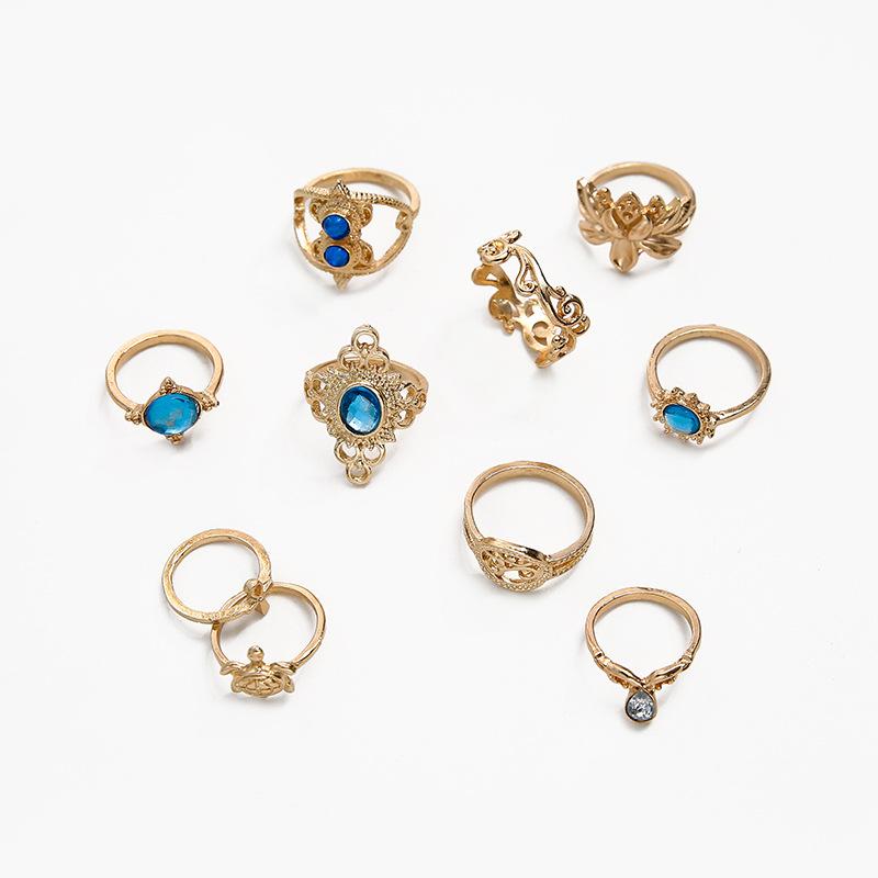 Vintage Gold Alloy Personality Female Style Flower Wave Sapphire 10-Piece Ring
Vintage Gold Alloy Personality Female Style Flower Wave Sapphire 10-Piece Ring