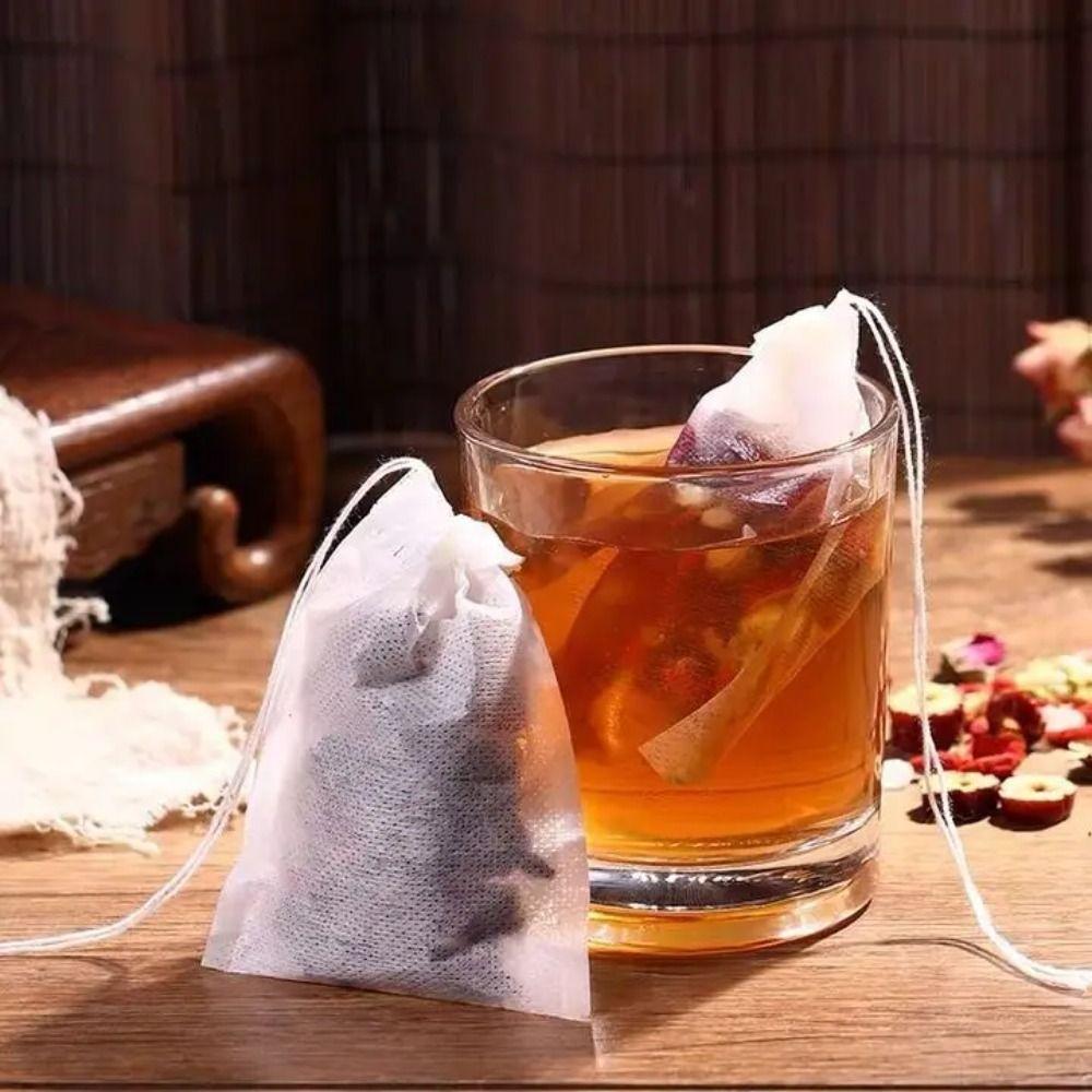 100Pcs Drawstring Disposable Coffee Pouches Non-woven Fabric Disposable Teabags Party Supply 10*12cm білий
100Pcs Drawstring Disposable Coffee Pouches Non-woven Fabric Disposable Teabags Party Supply 10*12cm білий