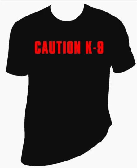 Caution k9 unisex T-Shirt 100% Cotton Premium Tee S,M,L,XL,XXL 4XL
Caution k9 unisex T-Shirt 100% Cotton Premium Tee S,M,L,XL,XXL 4XL