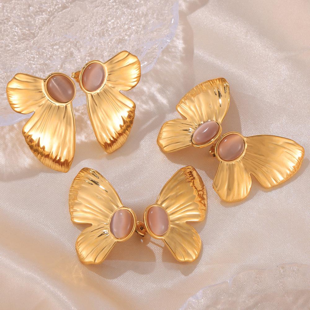 Korean Style Butterfly Inlaid Cat s Eye Stud Earrings, Simple & Versatile, 18K Gold Plated Titanium Steel.
Korean Style Butterfly Inlaid Cat s Eye Stud Earrings, Simple & Versatile, 18K Gold Plated Titanium Steel.