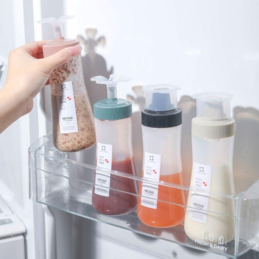 350ml Salad Sauce Dispenser 1/5 Nozzle Seasoning Jar Condiment Squeeze Bottle Mustard green-single hole 
350ml Salad Sauce Dispenser 1/5 Nozzle Seasoning Jar Condiment Squeeze Bottle Mustard green-single hole