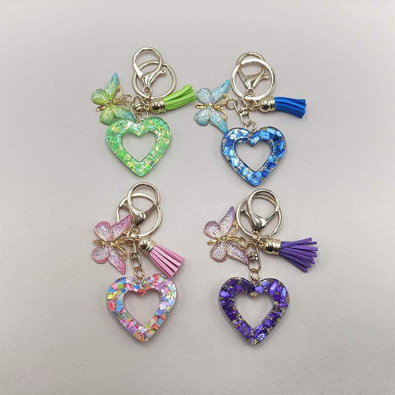 Exquisite Hollow Out Heart Keychain Cute Butterfly Tassels Key Ring Pendant Car Keychain Bag Decoration Couple Gifts
Exquisite Hollow Out Heart Keychain Cute Butterfly Tassels Key Ring Pendant Car Keychain Bag Decoration Couple Gifts