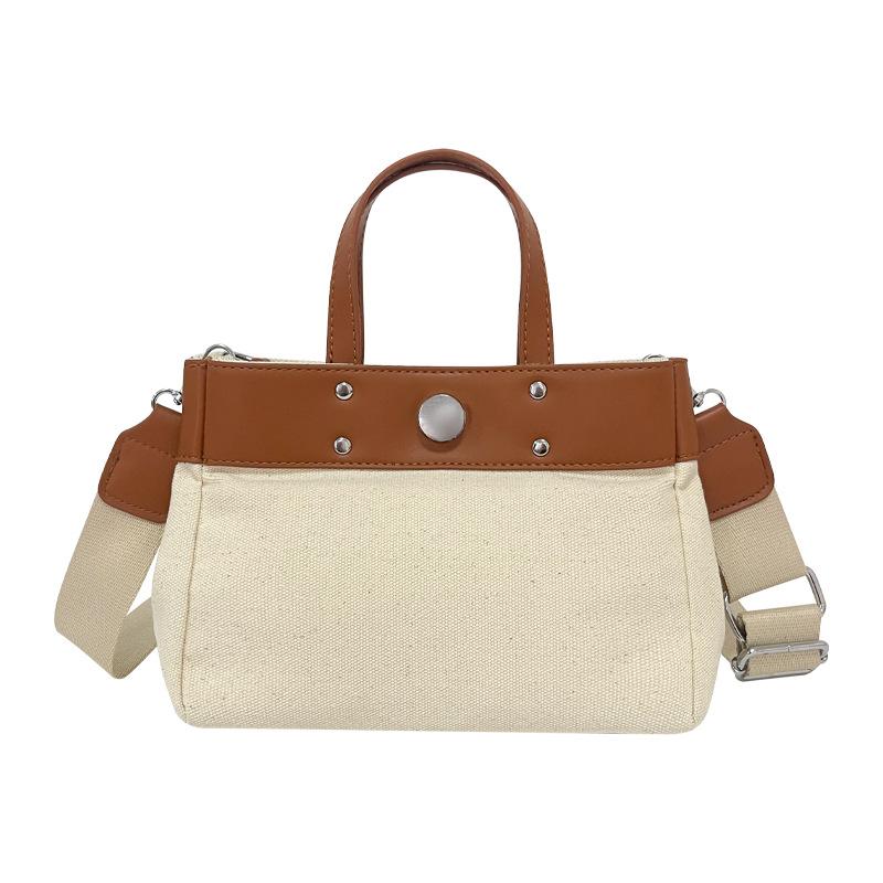 New niche design simple fashion canvas large capacity commuting wind tote bag casual texture hand without pendant коричневий
New niche design simple fashion canvas large capacity commuting wind tote bag casual texture hand without pendant коричневий