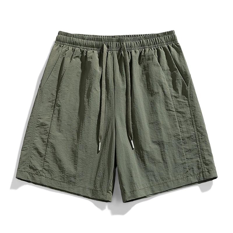 Summer Men s Fitness Sports Shorts Men Casual Solid Color Beach Shorts Men Quick Dry Breathable Running Shorts Male Swim Trunks 4XL
Summer Men s Fitness Sports Shorts Men Casual Solid Color Beach Shorts Men Quick Dry Breathable Running Shorts Male Swim Trunks 4XL