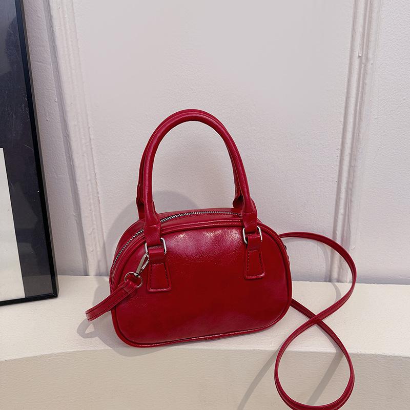 New niche design fashionable texture handbag bowling bag women s versatile shoulder messenger bag
New niche design fashionable texture handbag bowling bag women s versatile shoulder messenger bag