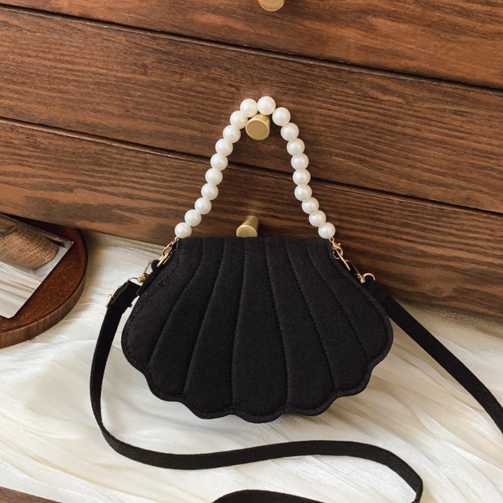 Chic Design Pearl Handheld Women s Bag Shell Shaped Solid Color Single-shoulder Bag Felt Shell Bag for Girls Students чёрный
Chic Design Pearl Handheld Women s Bag Shell Shaped Solid Color Single-shoulder Bag Felt Shell Bag for Girls Students чёрный