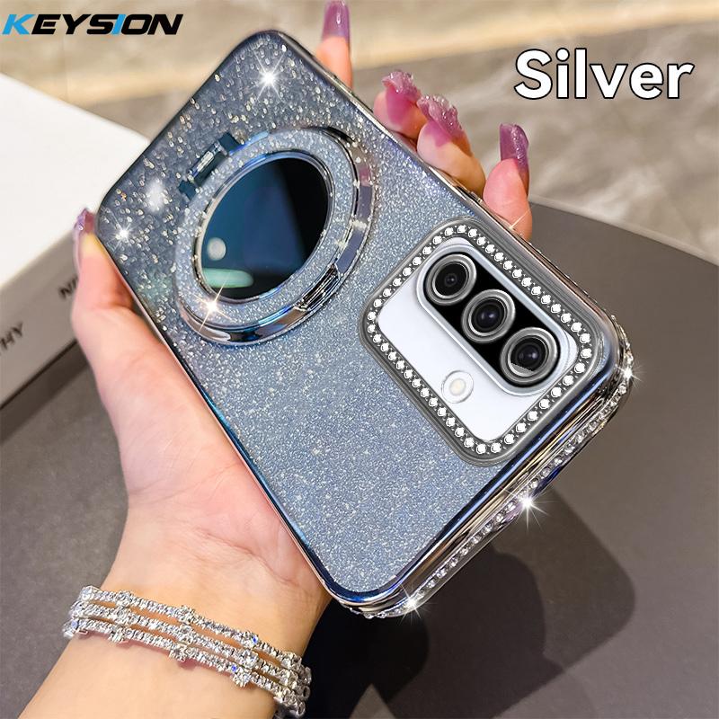 KEYSION Роскошный блестящий магнитный чехол с драгоценностями для Samsung Galaxy A56 5G A36 A26 A16, чехол-подставка с зеркалом для макияжа, противоударная крышка for Samsung A56 5G серебряный
KEYSION Роскошный блестящий магнитный чехол с драгоценностями для Samsung Galaxy A56 5G A36 A26 A16, чехол-подставка с зеркалом для макияжа, противоударная крышка for Samsung A56 5G серебряный