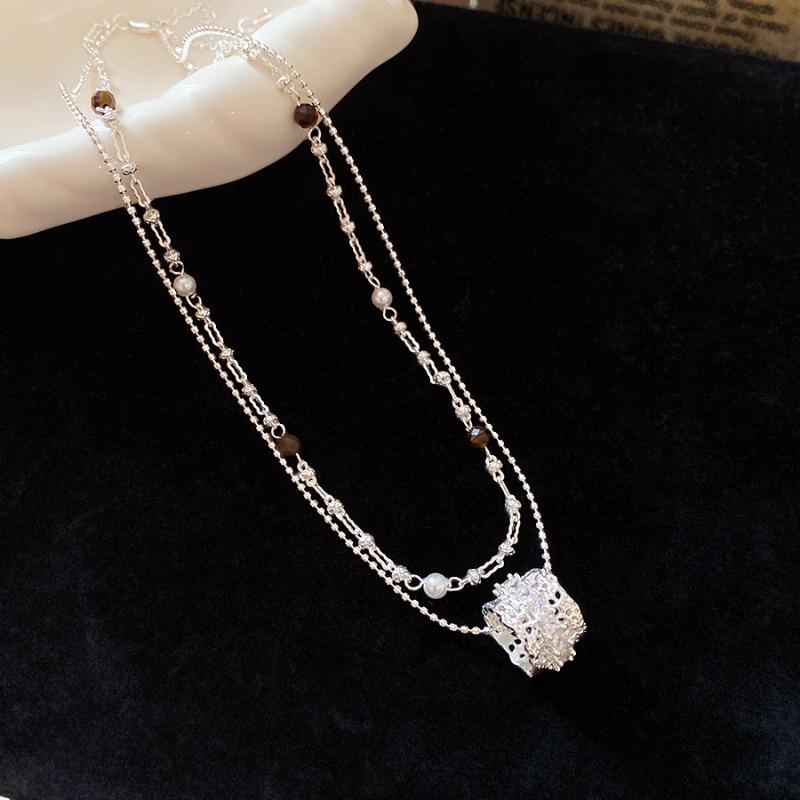 Meier Super sparkling zircon tiger eye stone pearl beaded double layer clavicle chain retro palace style necklace
Meier Super sparkling zircon tiger eye stone pearl beaded double layer clavicle chain retro palace style necklace