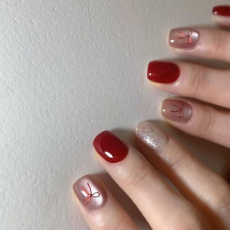 Crushed Glitter Cat Eye Bow Nails - Red Short Versatile Nail Art for Holiday Atmosphere
Crushed Glitter Cat Eye Bow Nails - Red Short Versatile Nail Art for Holiday Atmosphere