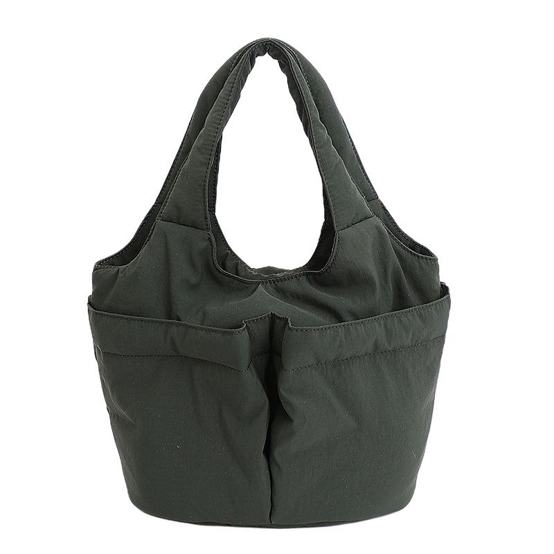 Korean version of Lazy Wind ins portable small bucket bag simple solid color nylon shoulder messenger bag зелений
Korean version of Lazy Wind ins portable small bucket bag simple solid color nylon shoulder messenger bag зелений