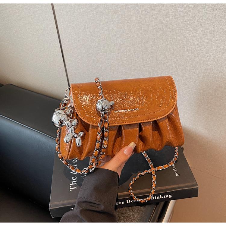 Нишевая дизайнерская сумка женская новая летняя цепочка сумка-мессенджер плиссированная сумка-облако коричневый
Нишевая дизайнерская сумка женская новая летняя цепочка сумка-мессенджер плиссированная сумка-облако коричневый