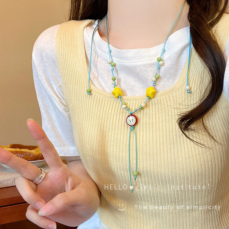 Childlike and cute Apple star pendant necklace female design sense long sweater chain neck match
Childlike and cute Apple star pendant necklace female design sense long sweater chain neck match