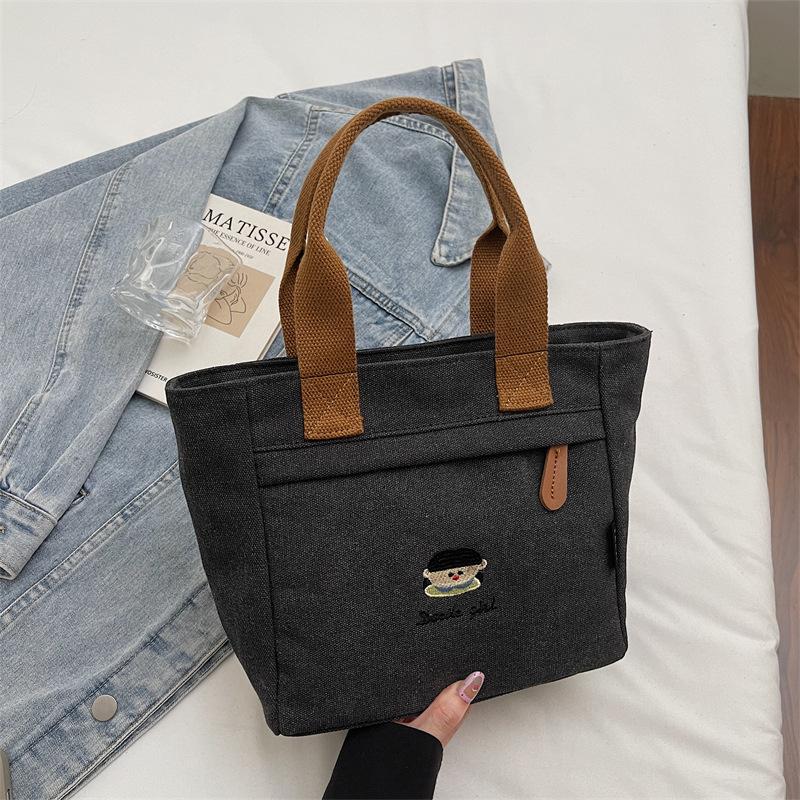 New Carto Embroidery Canvas Top-Handle Bags Fashi Casual Tote Bag Fashiable and Versatile for Daily Use Commuting Bag
New Carto Embroidery Canvas Top-Handle Bags Fashi Casual Tote Bag Fashiable and Versatile for Daily Use Commuting Bag