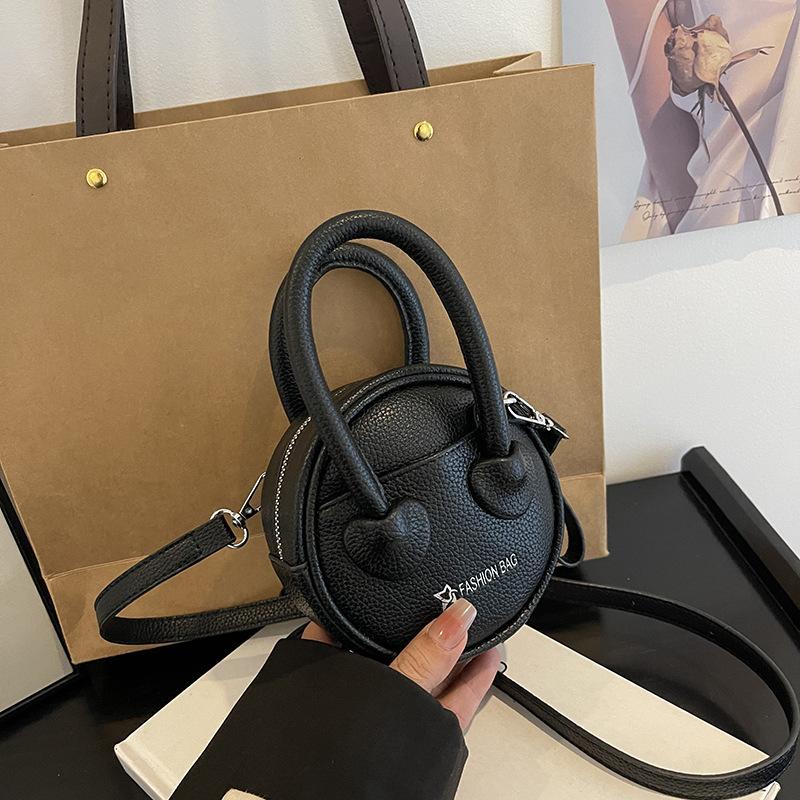 Summer high-end messenger bag women s new versatile simple mini round bag shoulder handbag чёрный
Summer high-end messenger bag women s new versatile simple mini round bag shoulder handbag чёрный