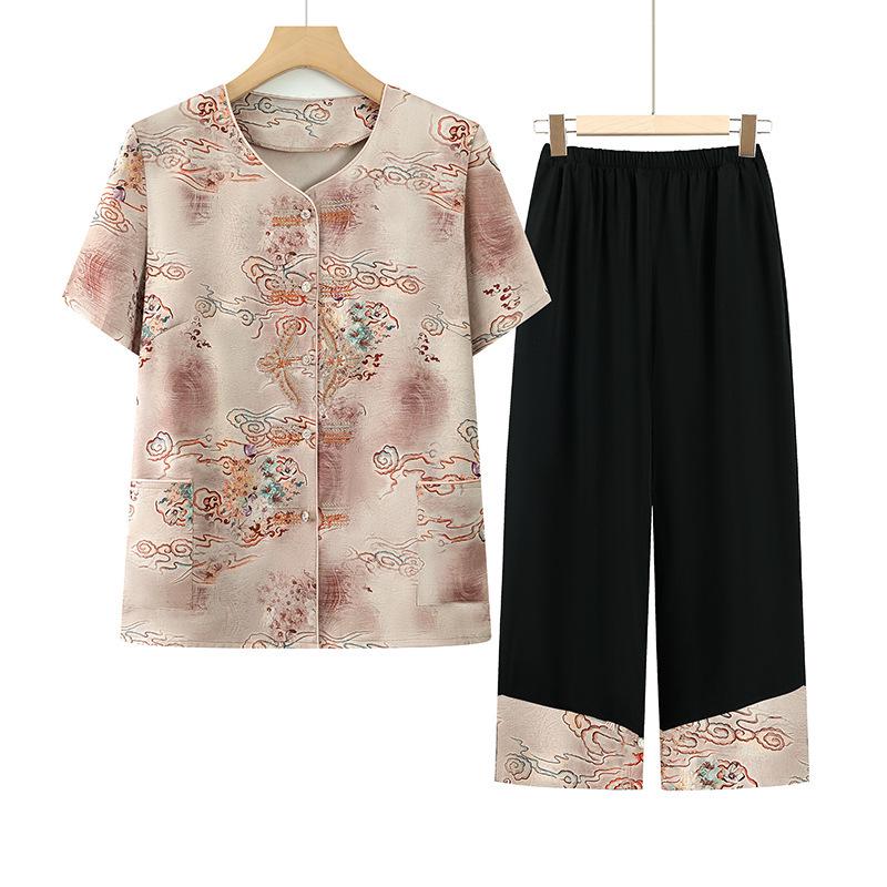 Women s Summer Two-Piece Middle-Aged Fashion: Grandma s Shirt & Pants Set 2XL - 115-125 kg
Women s Summer Two-Piece Middle-Aged Fashion: Grandma s Shirt & Pants Set 2XL - 115-125 kg