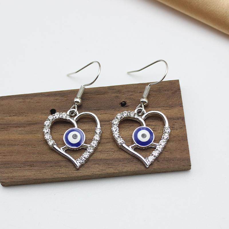 Alloy Hollow Out Heart Blue Evil Eyes Pendant Drop Earring for Women Copper Color Rhinestone Crystal Zircon Wedding Girl Gift
Alloy Hollow Out Heart Blue Evil Eyes Pendant Drop Earring for Women Copper Color Rhinestone Crystal Zircon Wedding Girl Gift