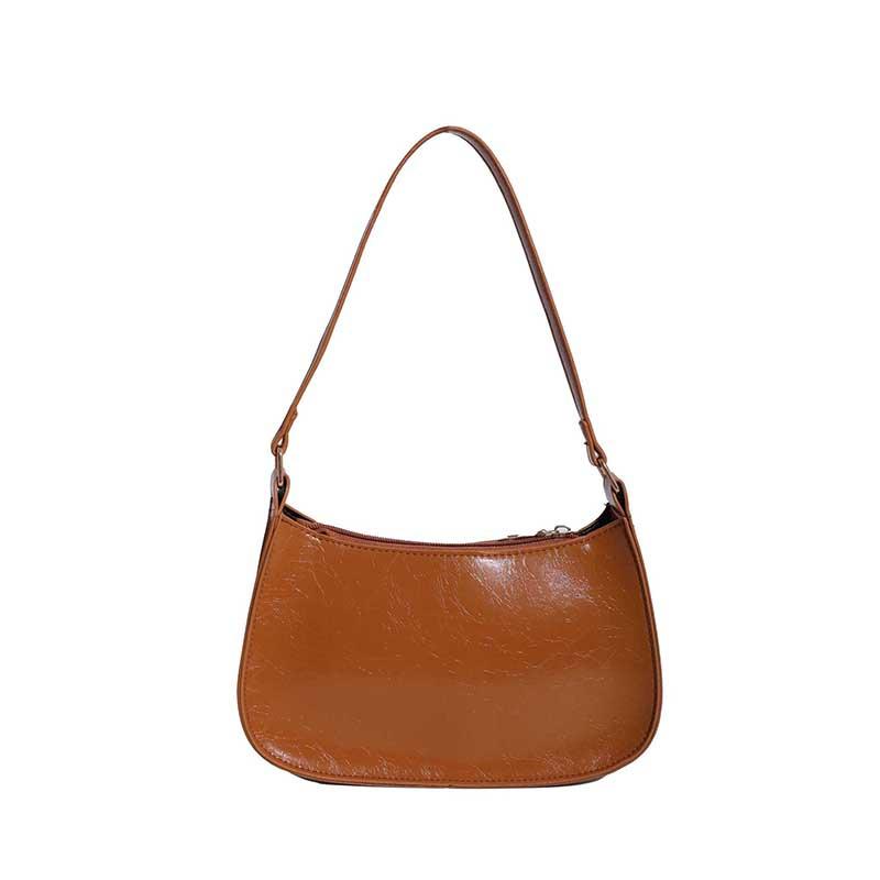 Summer new temperament fashionable foreign retro large capacity solid color simple texture single shoulder armpit bag women коричневий
Summer new temperament fashionable foreign retro large capacity solid color simple texture single shoulder armpit bag women коричневий
