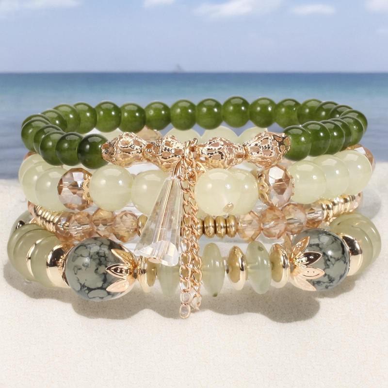 Шикарний богемний чотиришаровий браслет з жіночою китицею з скляних намистин
Шикарний богемний чотиришаровий браслет з жіночою китицею з скляних намистин