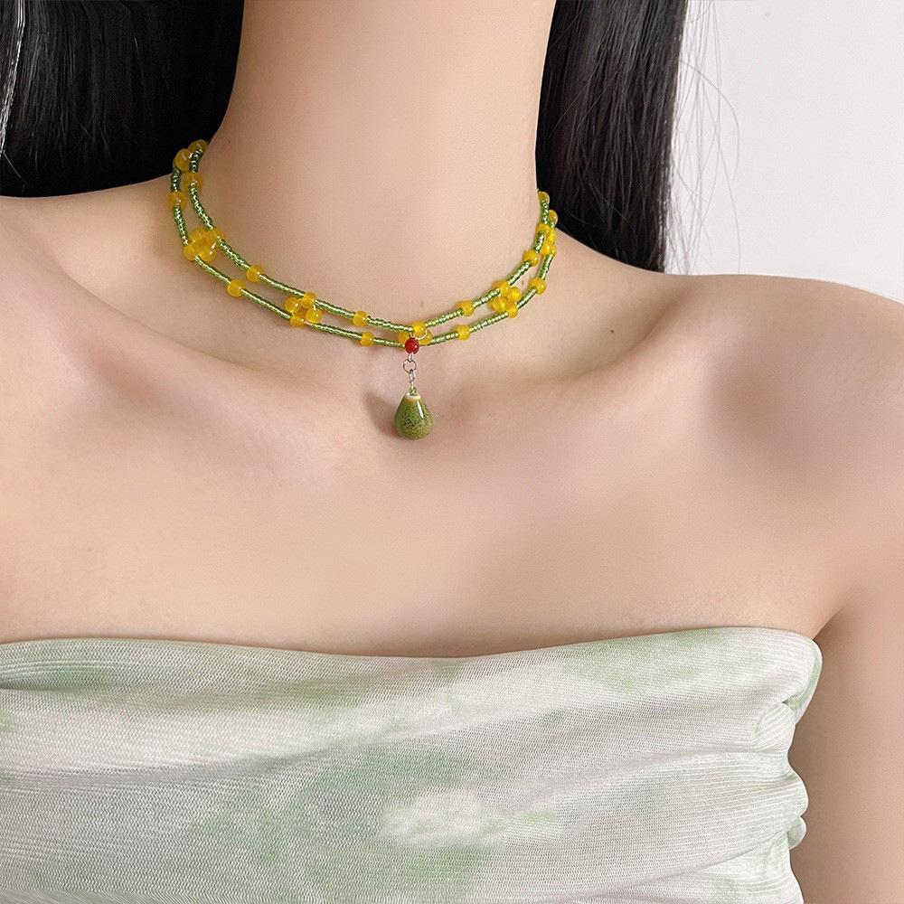 Glass beaded ceramic multi-layer pendant necklace summer versatile collarbone chain temperament fashion niche jewelry
Glass beaded ceramic multi-layer pendant necklace summer versatile collarbone chain temperament fashion niche jewelry