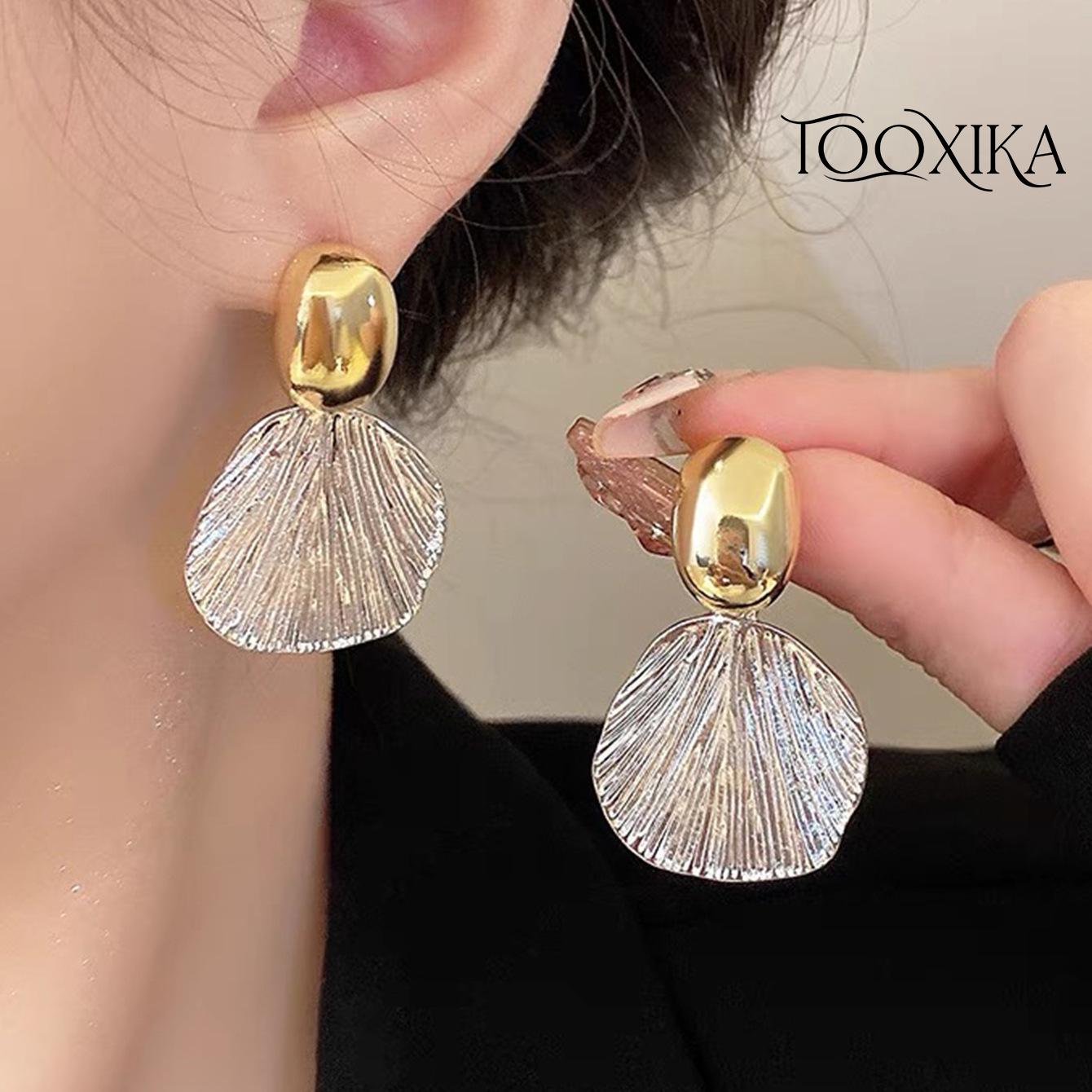 Tooxika Light, роскошные женские серьги высокого класса в виде ракушек, нишевый темперамент, холодный стиль, банкетные серьги, новый хит
Tooxika Light, роскошные женские серьги высокого класса в виде ракушек, нишевый темперамент, холодный стиль, банкетные серьги, новый хит