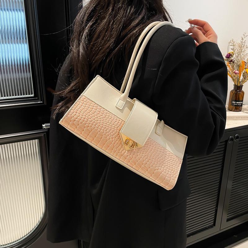 Spring new temperament armpit bag splicing portable women s bag fashion lock crocodile pattern shoulder bag червоний
Spring new temperament armpit bag splicing portable women s bag fashion lock crocodile pattern shoulder bag червоний