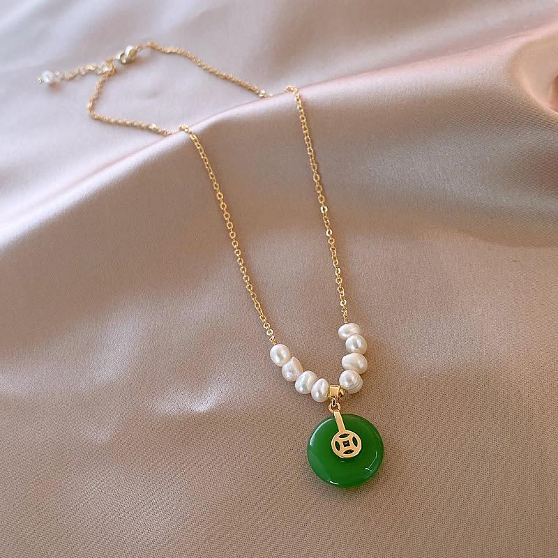 Женский комплект ожерелья и браслета с подвеской Фу из неправильного пресноводного жемчуга и нефрита
Женский комплект ожерелья и браслета с подвеской Фу из неправильного пресноводного жемчуга и нефрита