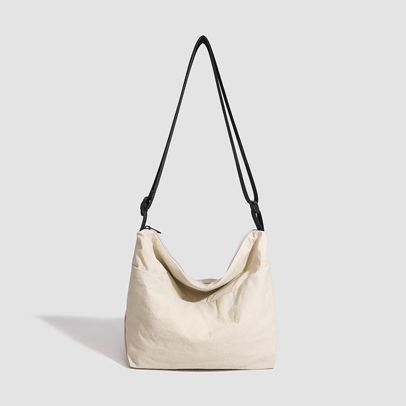 New Niche Korean Lightweight Large Capacity Bag Casual All-matching Oxford Cloth Shoulder Nylon Commuter Messenger off білий колір
New Niche Korean Lightweight Large Capacity Bag Casual All-matching Oxford Cloth Shoulder Nylon Commuter Messenger off білий колір