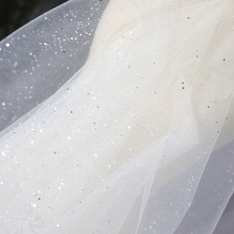 Stiff glittering shiny sequin net fabric suitable for wedding dresses formal gowns and handmade DIY clothing fabrics 1.5M&1M срібний
Stiff glittering shiny sequin net fabric suitable for wedding dresses formal gowns and handmade DIY clothing fabrics 1.5M&1M срібний