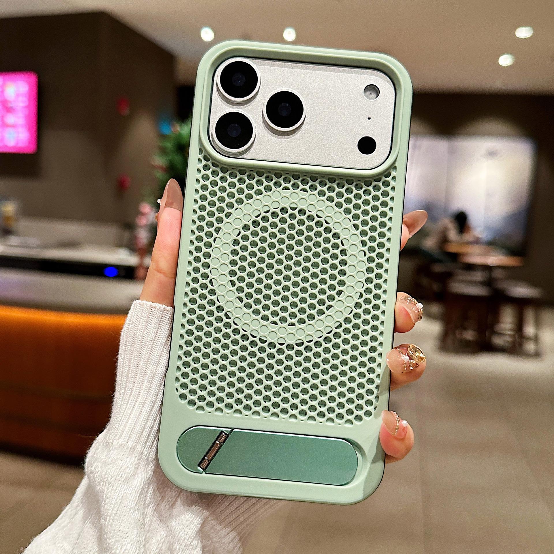 iPhone16 Summer Honeycomb Heat Dissipation Case for Apple 17 Pro Max with Invisible Stand and Magnetic Protection for iPhone 14/15. 16 Pro Max зелёный
iPhone16 Summer Honeycomb Heat Dissipation Case for Apple 17 Pro Max with Invisible Stand and Magnetic Protection for iPhone 14/15. 16 Pro Max зелёный