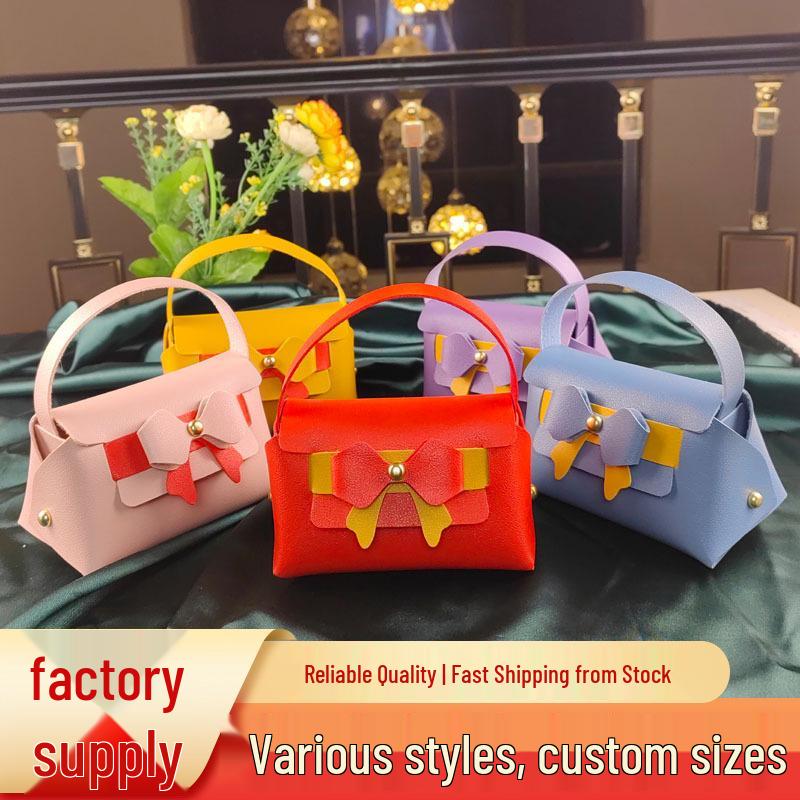 New Style Leather Handbag Wedding Candy Gift Box Souvenir 10*7*7cm (Holds cigarettes or candy) красный
New Style Leather Handbag Wedding Candy Gift Box Souvenir 10*7*7cm (Holds cigarettes or candy) красный